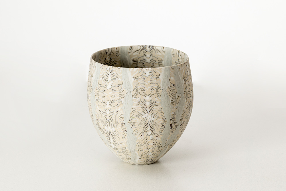 David Pottinger, Small nerikomi vessel 2015, porcelain, Gift of Beth Brown and Tom Bruce AM through the Australian Government’s Cultural Gifts Program, 2023, Photographer: Andrew Curtis, © the artist