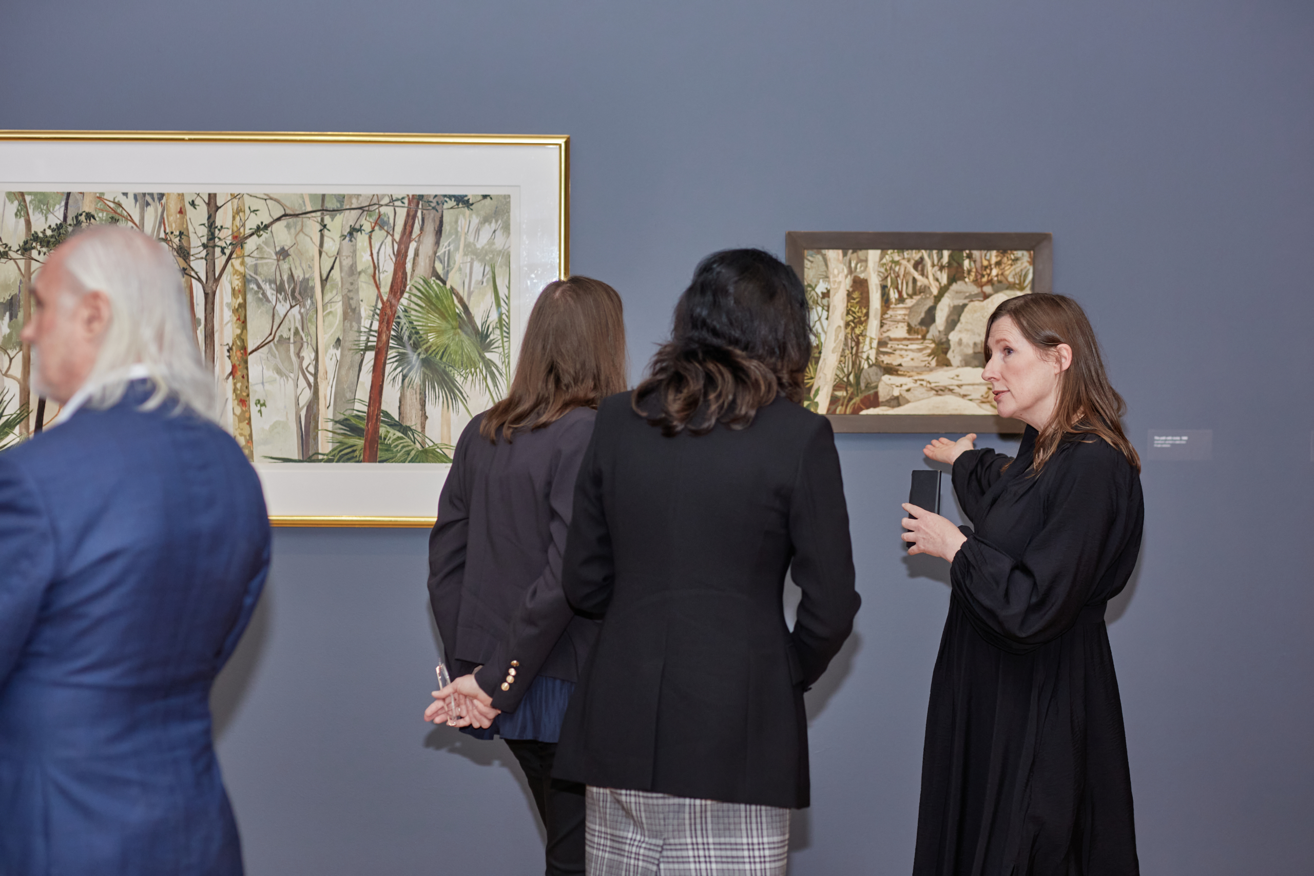 Geelong Gallery partners enjoying a curator tour of an exhibition
