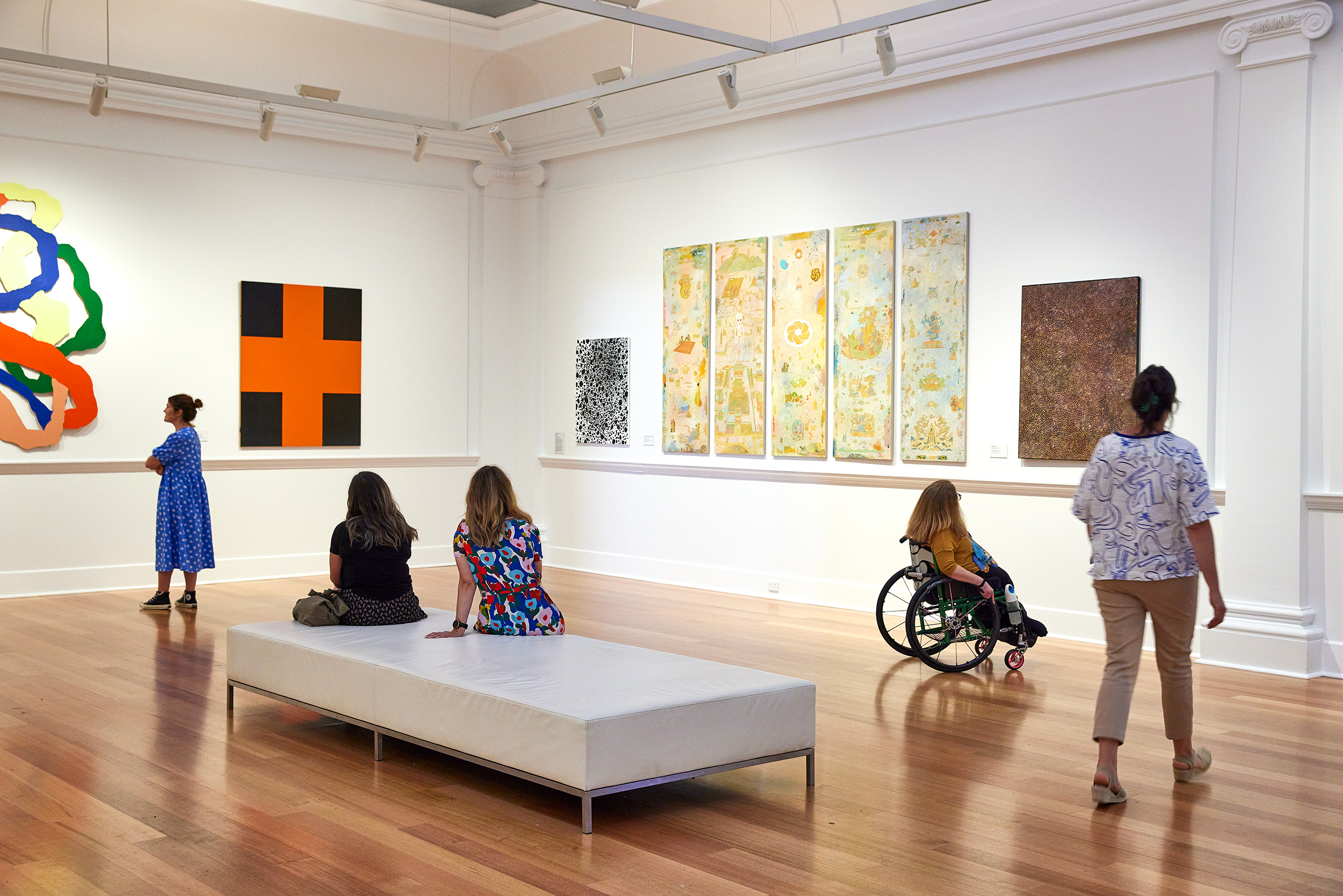Visitors looking at artwork in Geelong Gallery